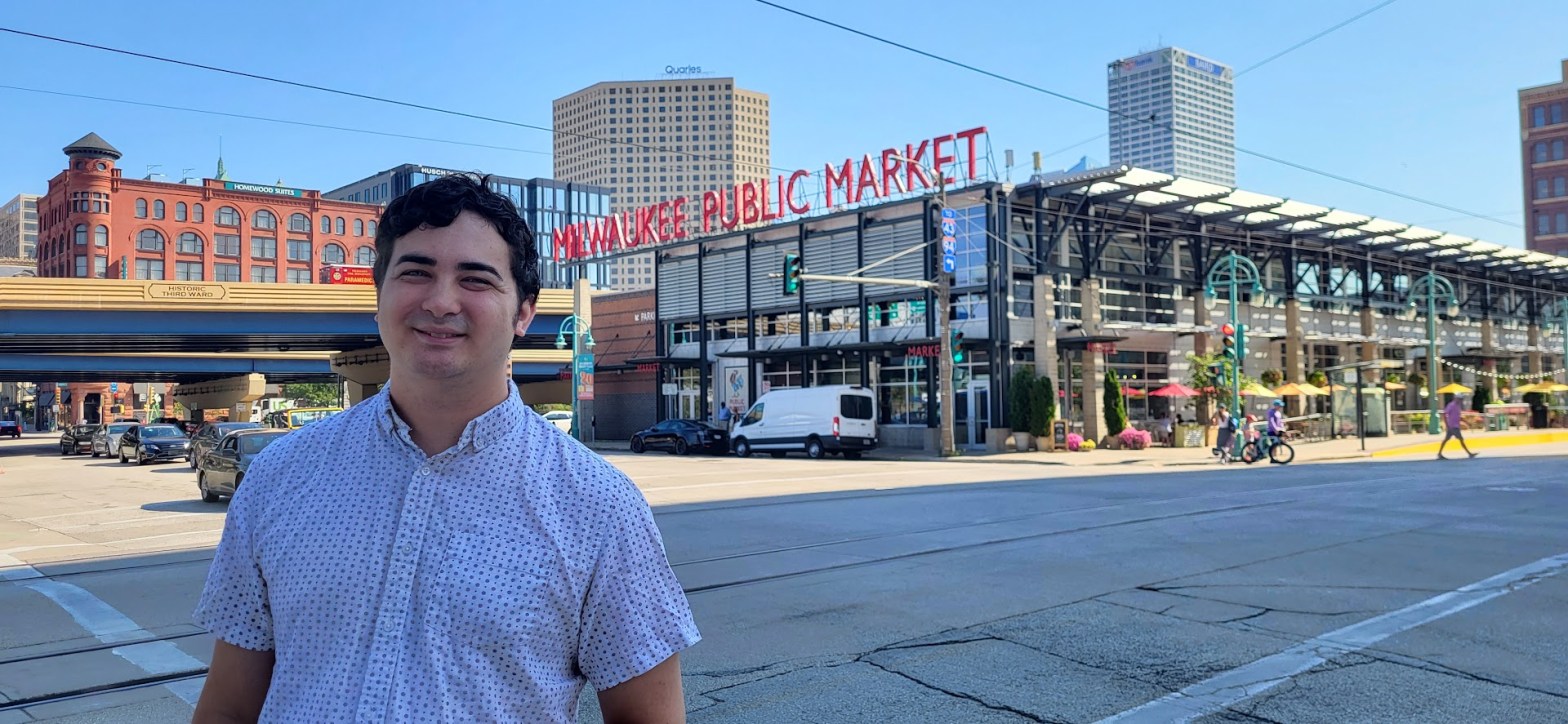 Tang in front of the Milwaukee Public Market